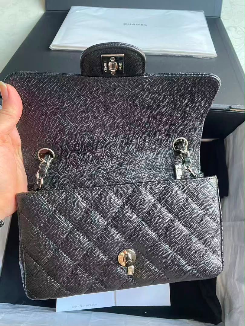 Chanel black caviar mini rectangular flap bag with silver hardware