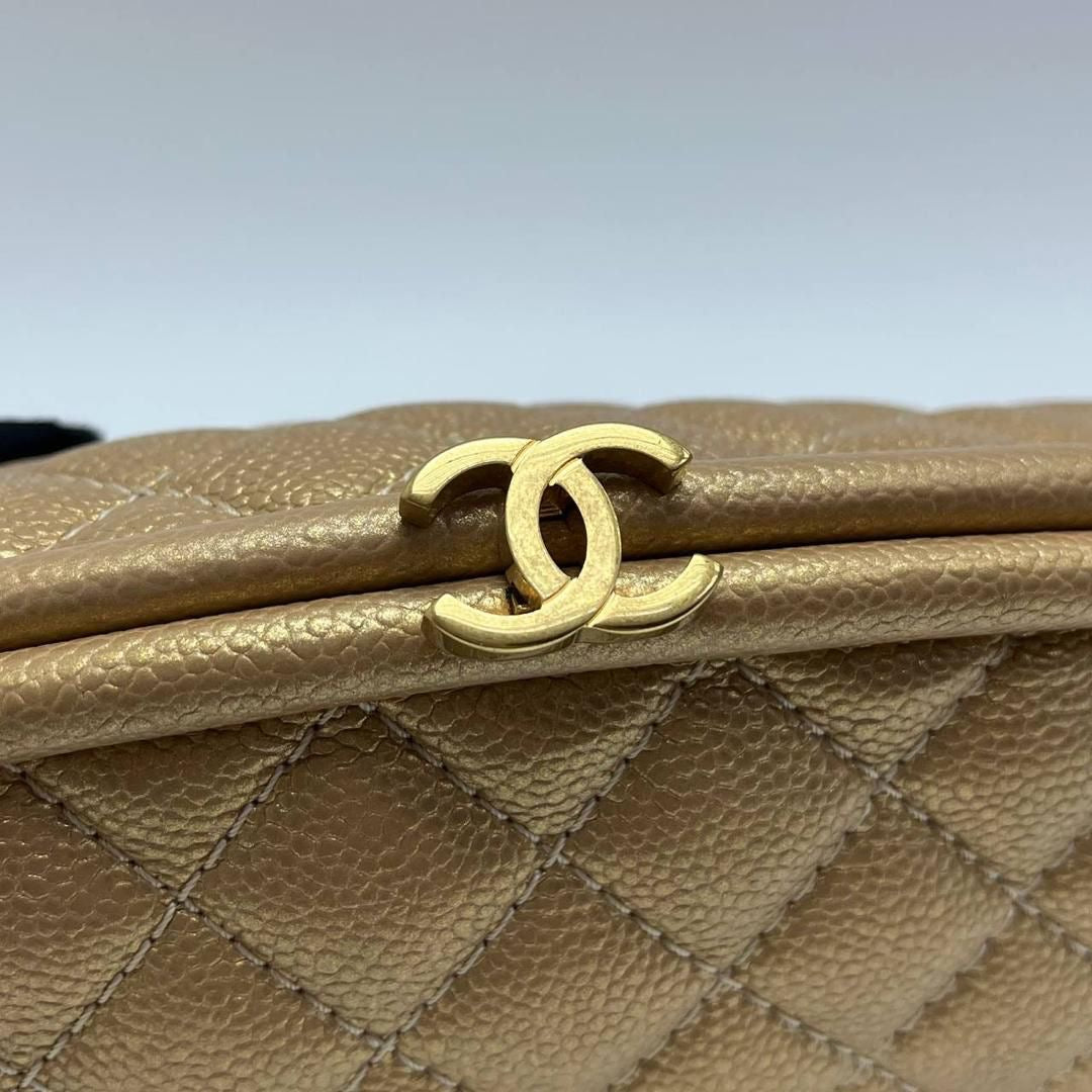 Chanel vintage gold caviar kisslock clutch bag