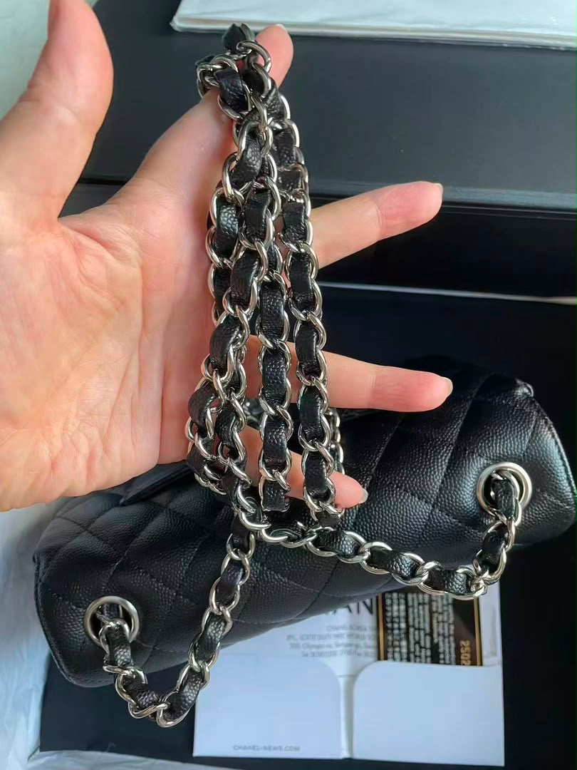 Chanel black caviar mini rectangular flap bag with silver hardware