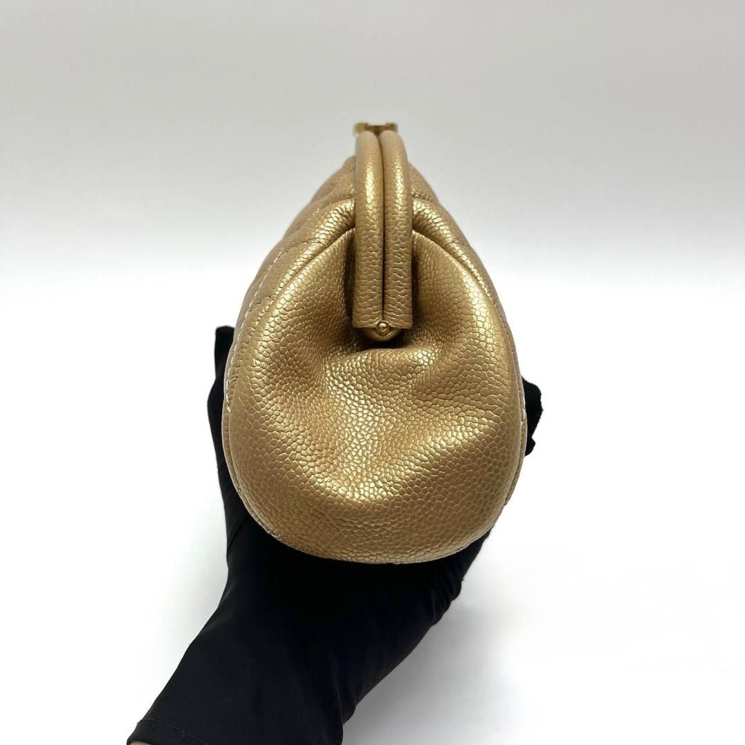 Chanel vintage gold caviar kisslock clutch bag