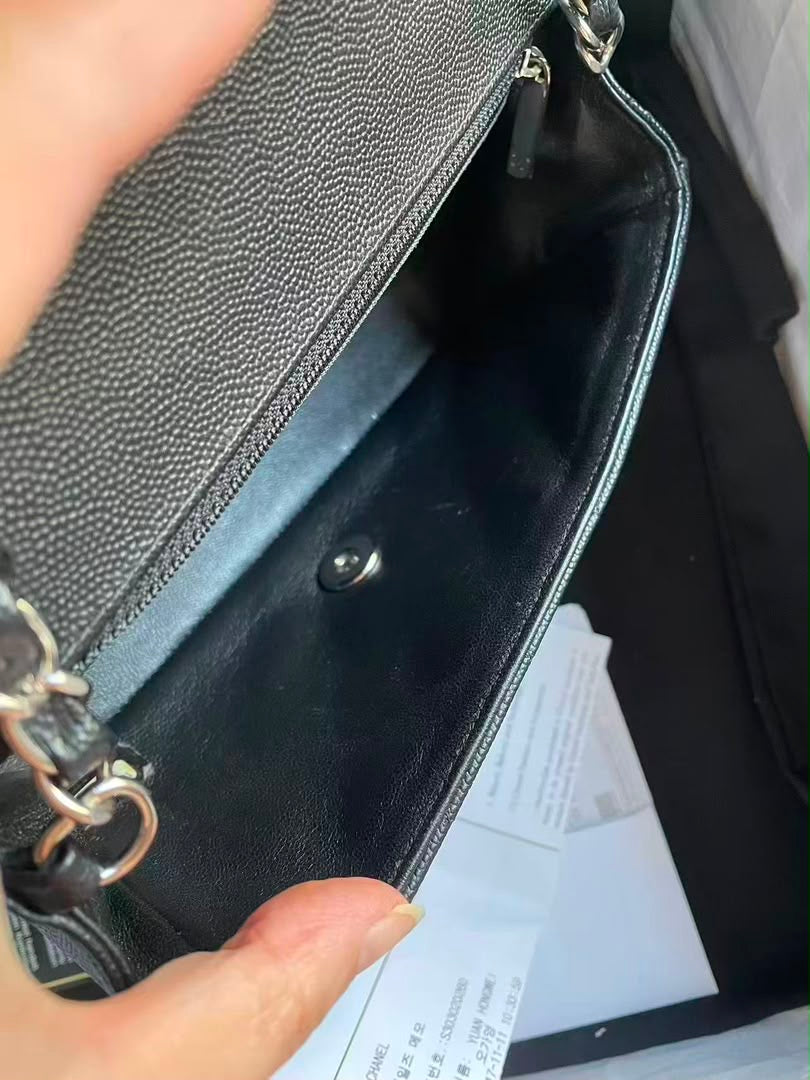 Chanel black caviar mini rectangular flap bag with silver hardware
